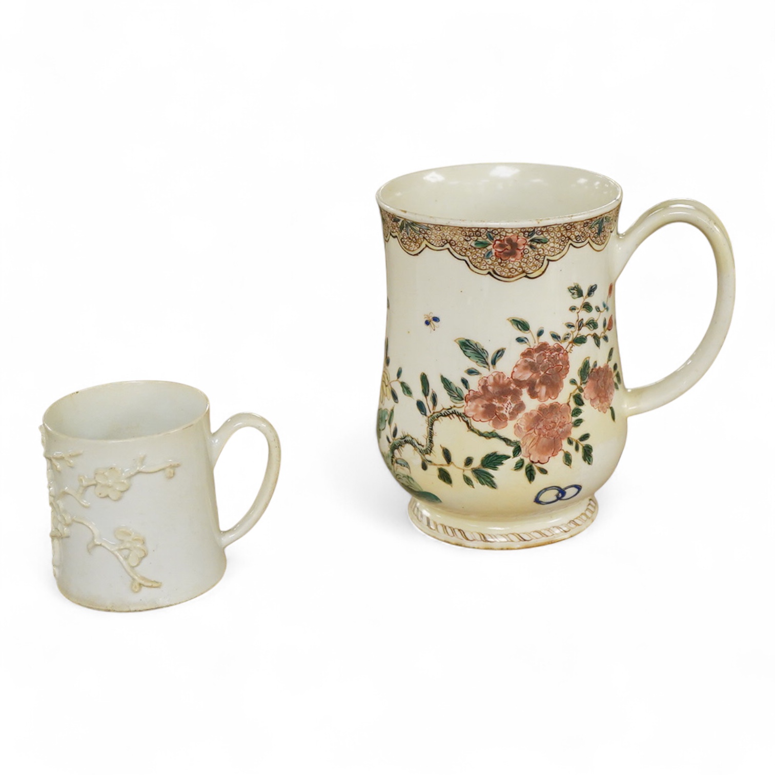 A Bow polychrome mug - 11.5cm high and a Bow prunus sprigged coffee can, c.1760-70